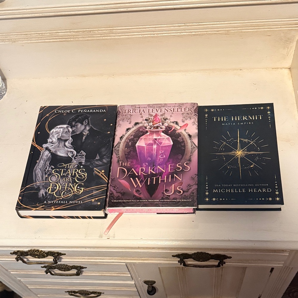 Fantasy and Romance books the hermit the darkness within us the stars are dying